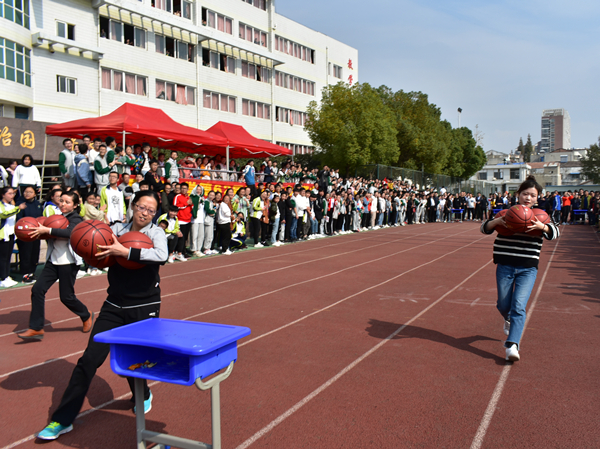 运动促健康 竞争添乐趣——肥西中学举行教职工趣味运动会(图1)